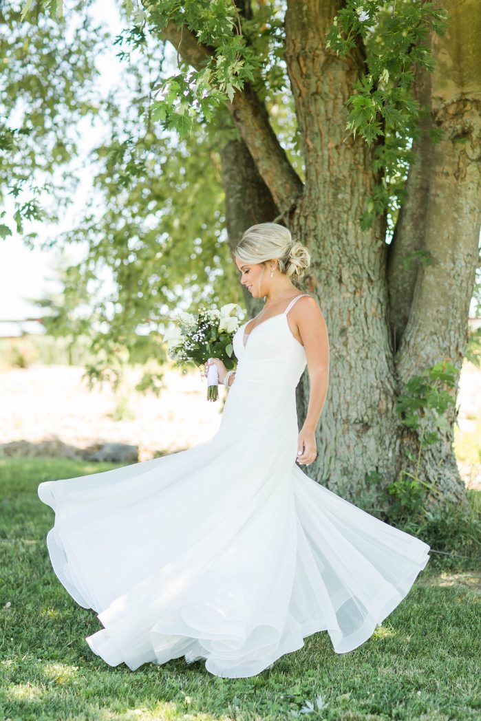 Bride twirling at Peacock Ridge Wedding Photographer Akron Ohio
