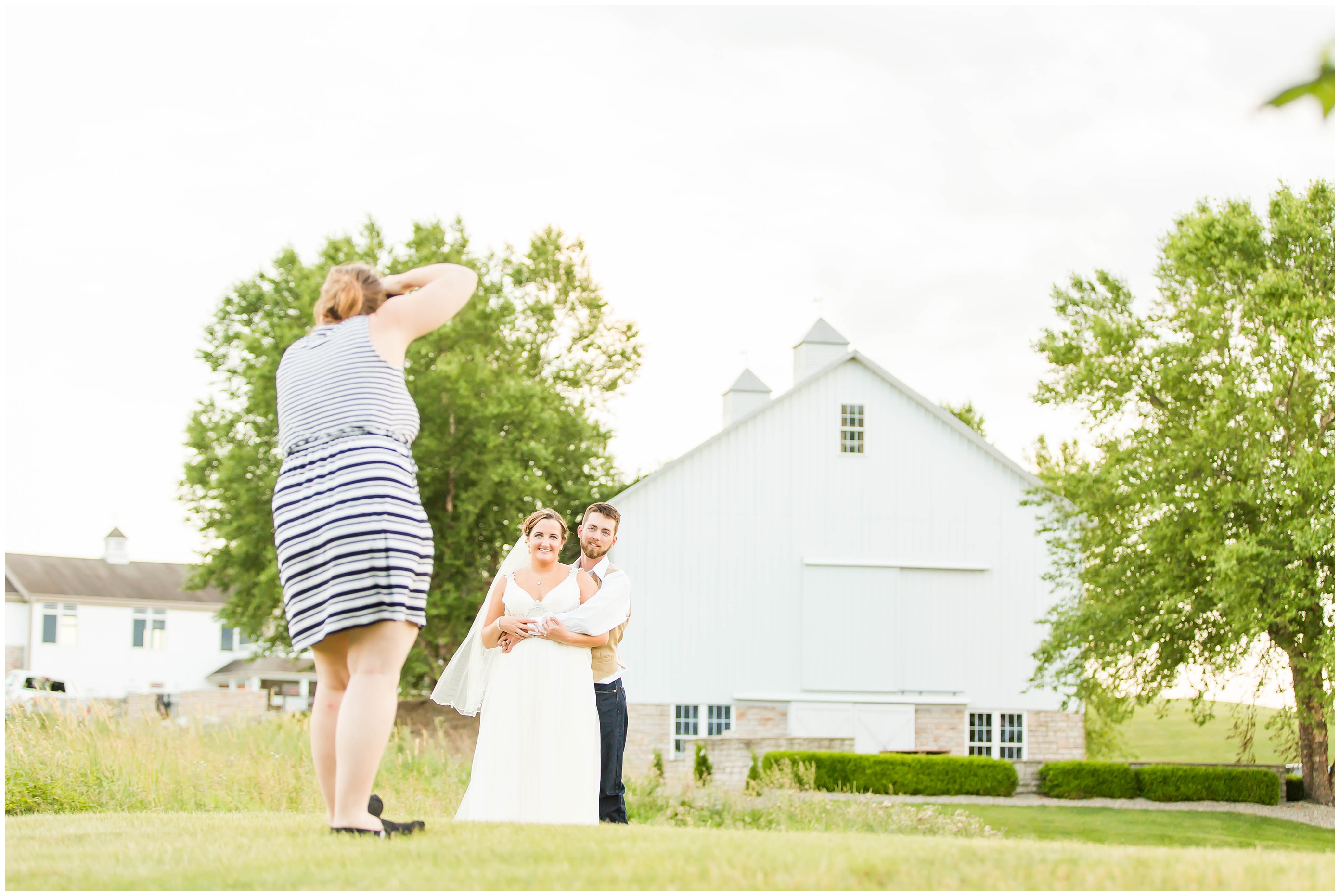 Cleveland Wedding Photographer,classic tractor with bride and groom,loren jackson photography,photographer akron ohio,wheat field wedding photos,