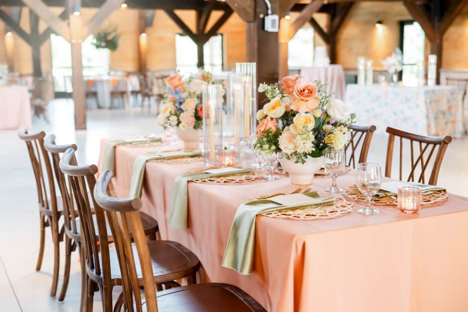Soft romantic reception design with florals and linens at Nature Valley Lodge, captured by wedding photographer Cleveland OH in collaboration with Savvy Jane Planning